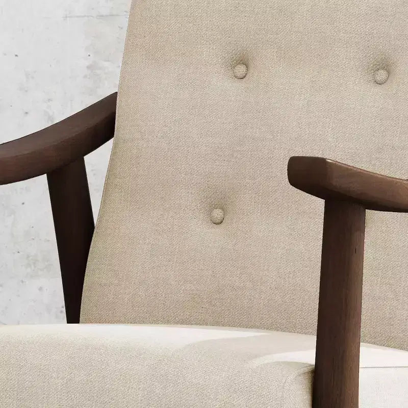 Poltrona trapuntata beige, struttura in metallo marrone, schienale basso, 1 posto