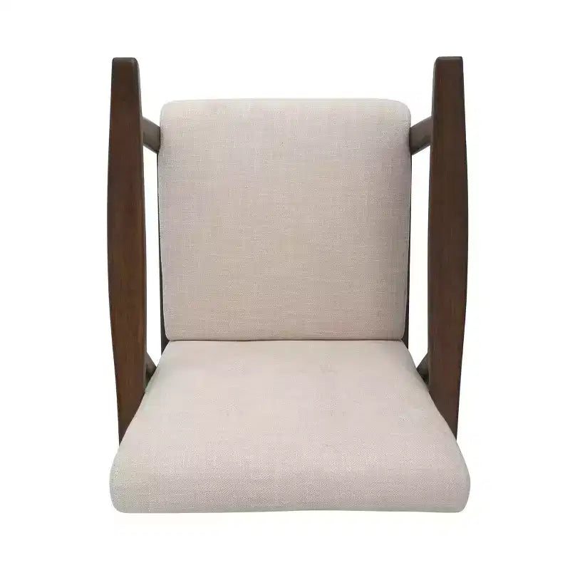 Poltrona trapuntata beige, struttura in metallo marrone, schienale basso, 1 posto