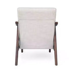 Poltrona trapuntata beige, struttura in metallo marrone, schienale basso, 1 posto