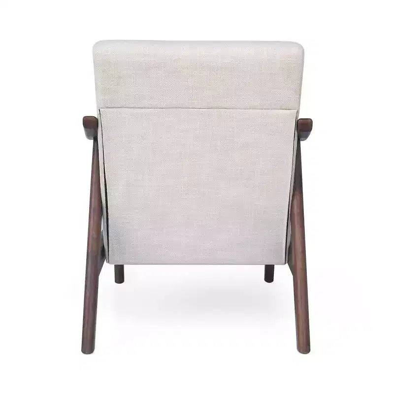 Poltrona trapuntata beige, struttura in metallo marrone, schienale basso, 1 posto